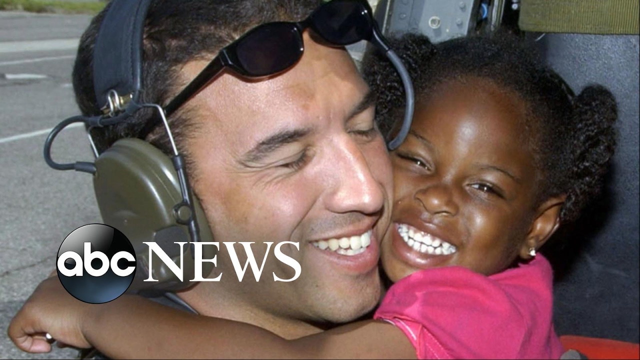 Little girl rescued from Hurricane Katrina reunited with the airman who saved her