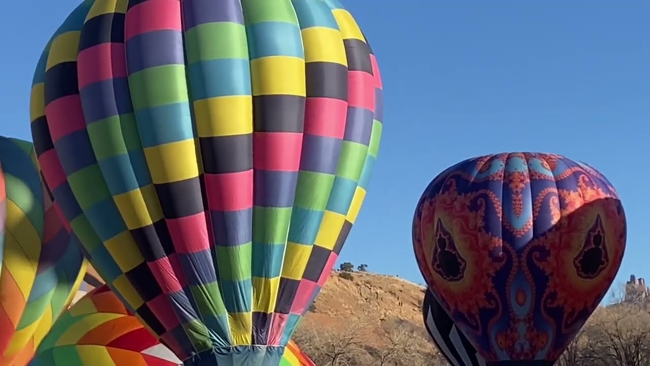 Group of hot air balloons getting ready to take flight