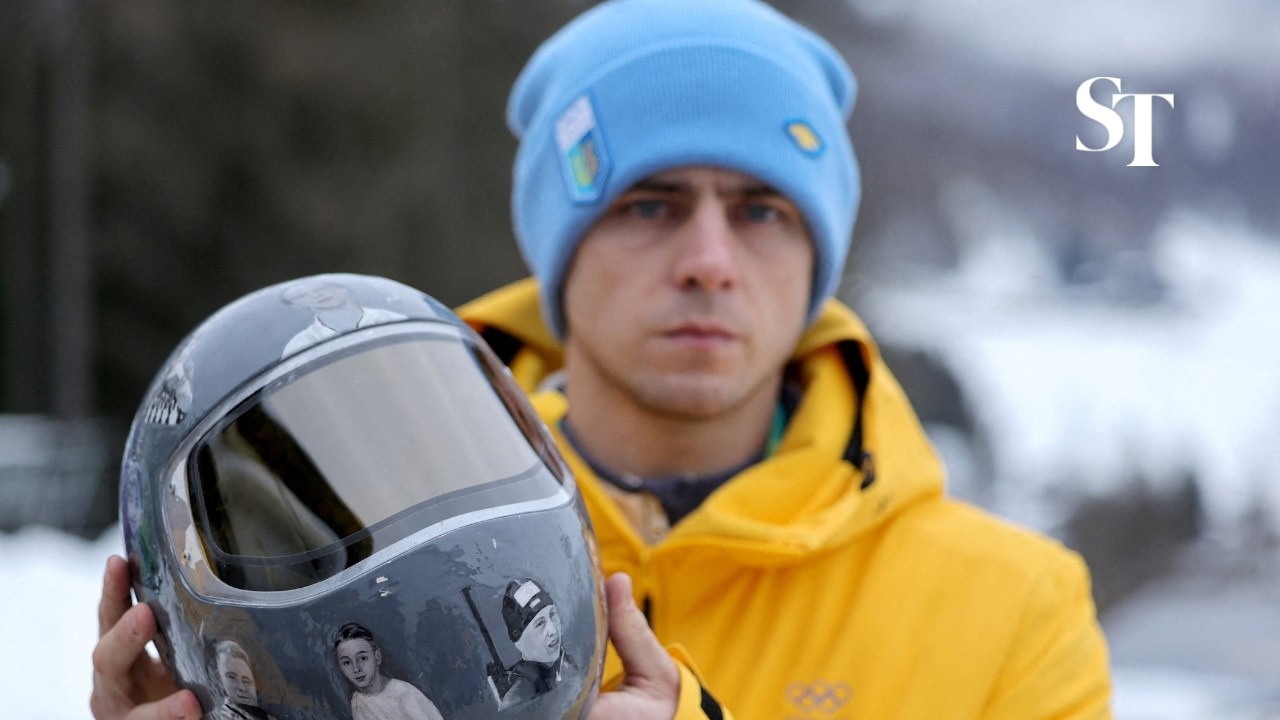 Ukrainian athlete banned from Winter Olympics for wearing helmet honouring war dead