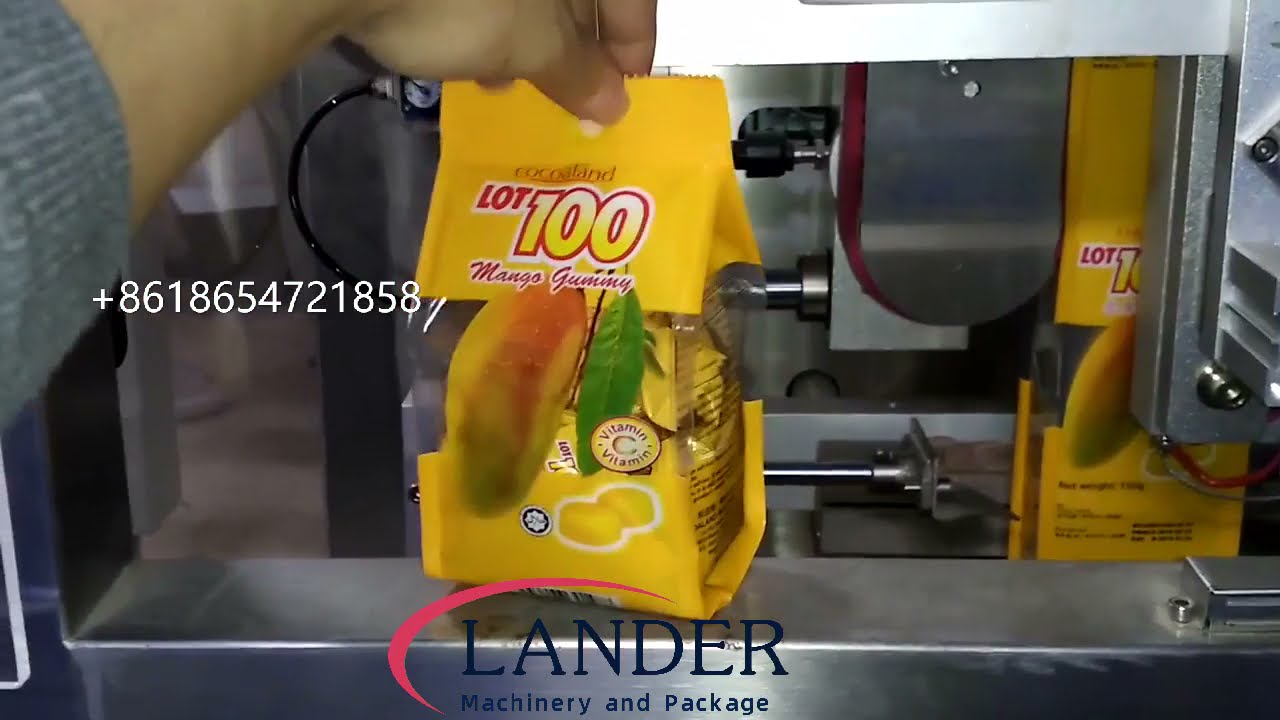 Candy packaging machine to pack certain quantity of individual packed candies into big bags
