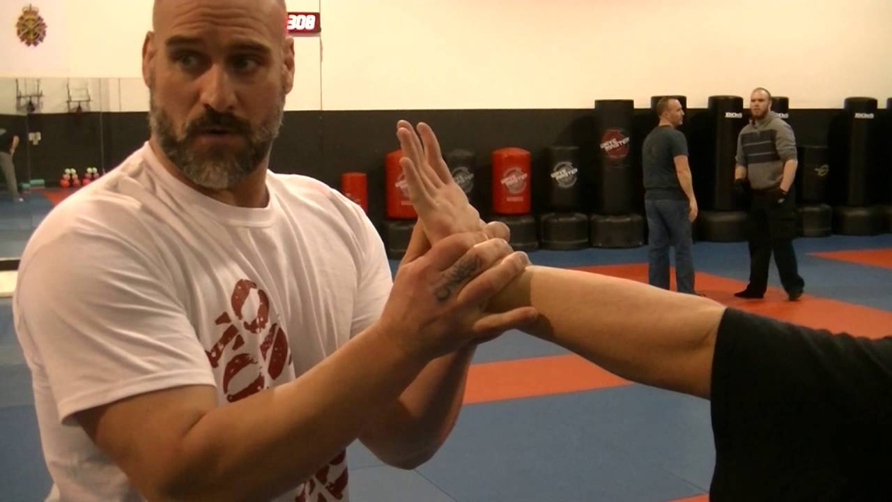 Wrist lock - Standing Arm bar to Hammer lock (lock flow)