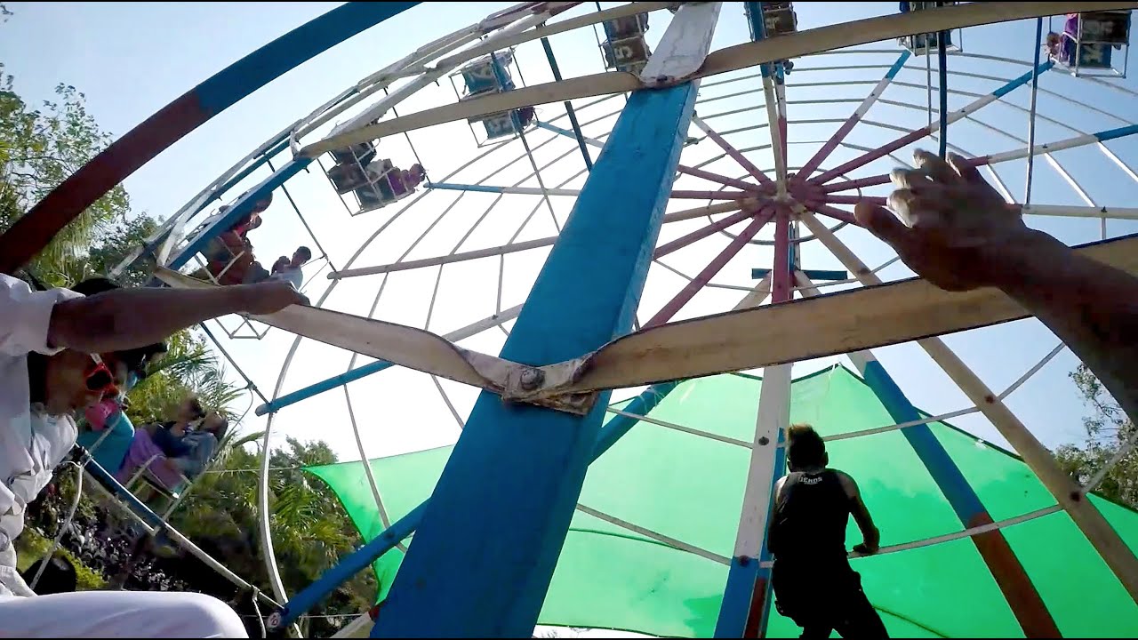 Myanmar Daredevil Ferris Wheel Climber