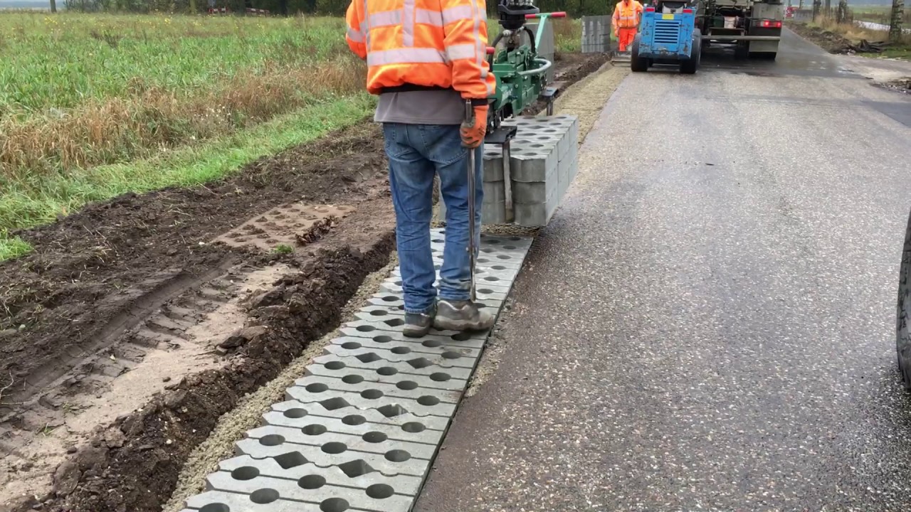 Grasbetontegels aanbrengen met hunklinger klem HWC