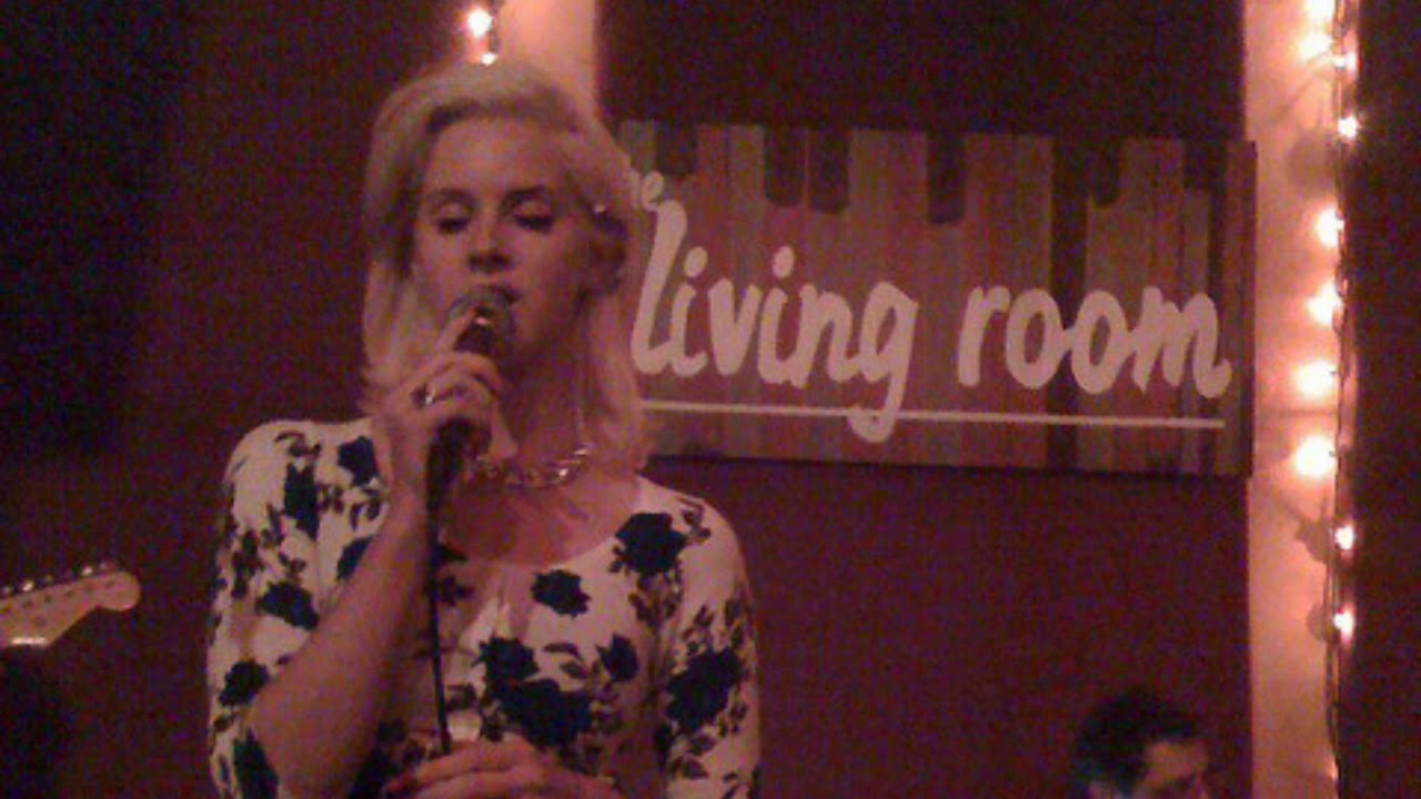 oh say can you see but you're in 2010, in a bar, and some girl is singing on stage