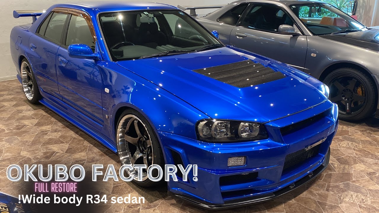 Посмотрите на наш полностью переделанный седан R34 GTR в стиле Okubo Factory с широким кузовом.