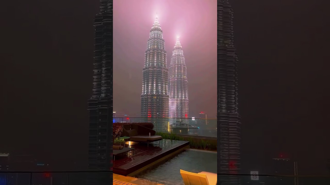 Rainy night vibes in Kuala Lumpur 🇲🇾 &mdash; city lights dancing on wet streets 🌃☔️