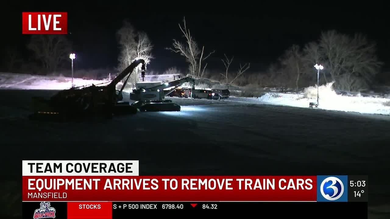 Recovery crews prepare to move train cars