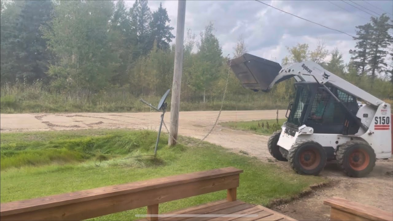 Unnecessary Satellite Dish Removal Using A Bobcat