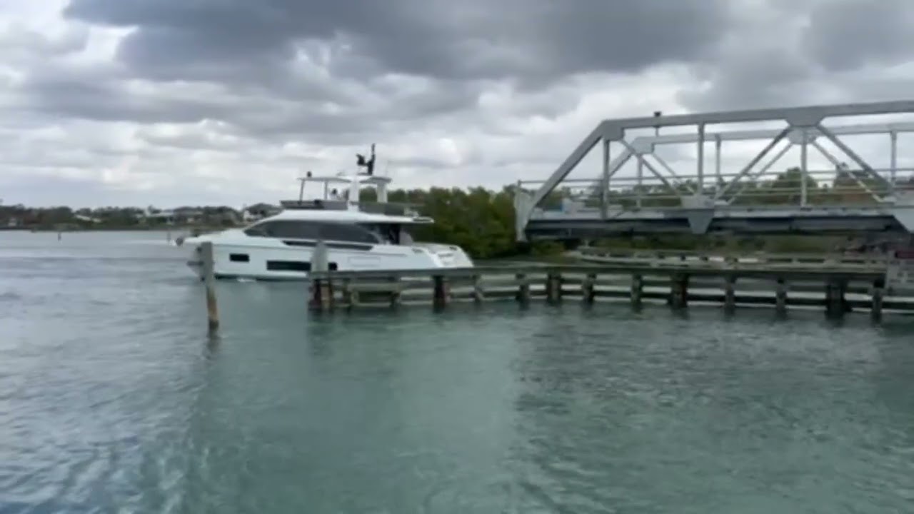 Yachts driving by the drawbridge 