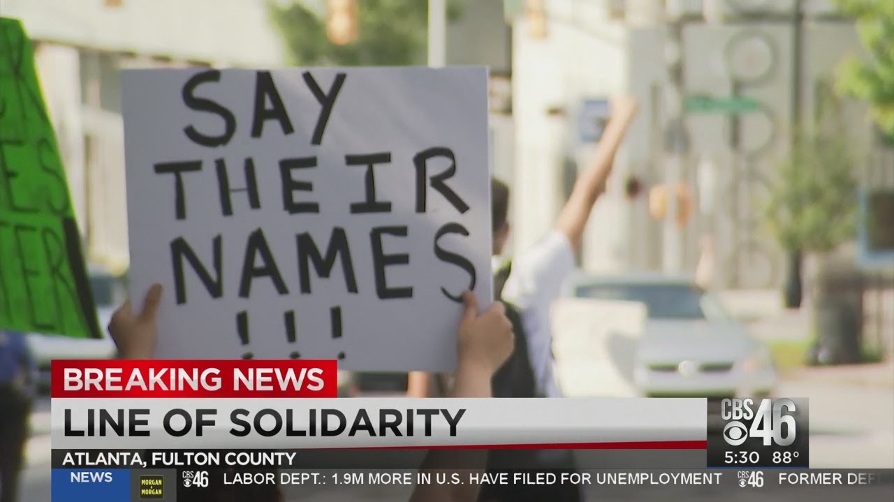 Peaceful protest shows line of solidarity in Atlanta