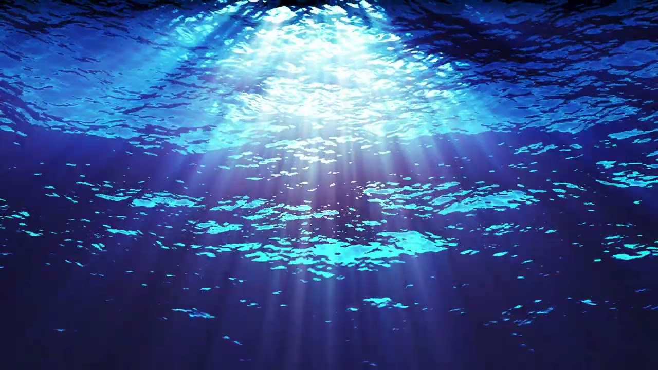 Underwater Light Shining Down through Blue Water - Loop Free Stock Video