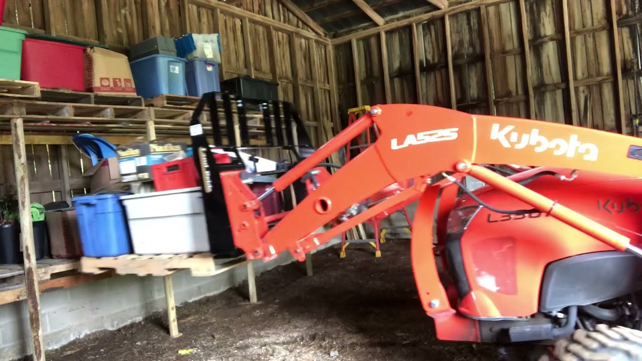 Вилы для поддонов Land Pride и самодельная система хранения поддонов с трактором Kubota L3301