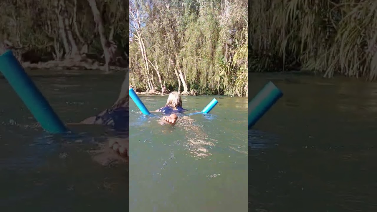 Gregory Downs free camping area swimming in the river.