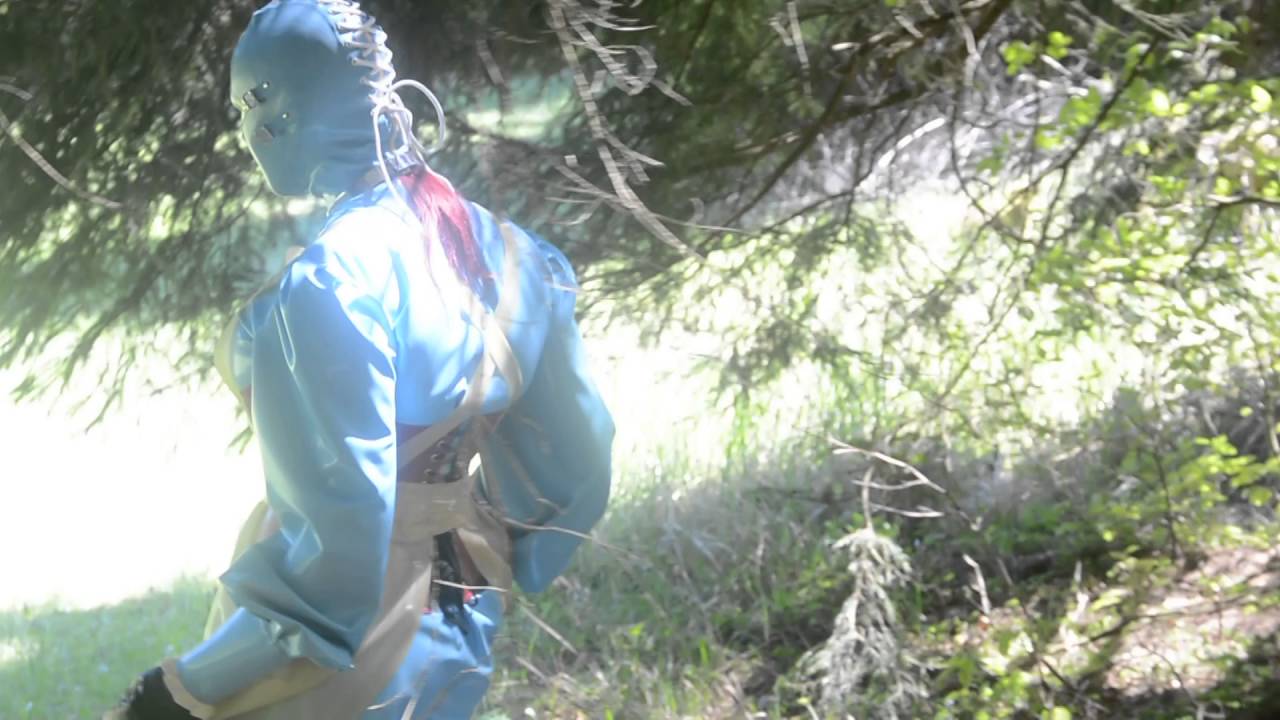 Rubber dress in the woods