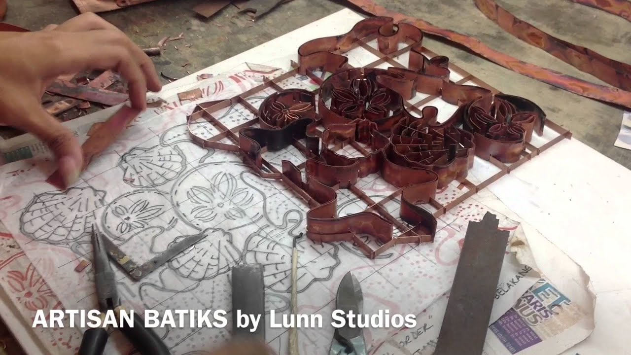 How Batiks Are Made - Making the cap by hand.