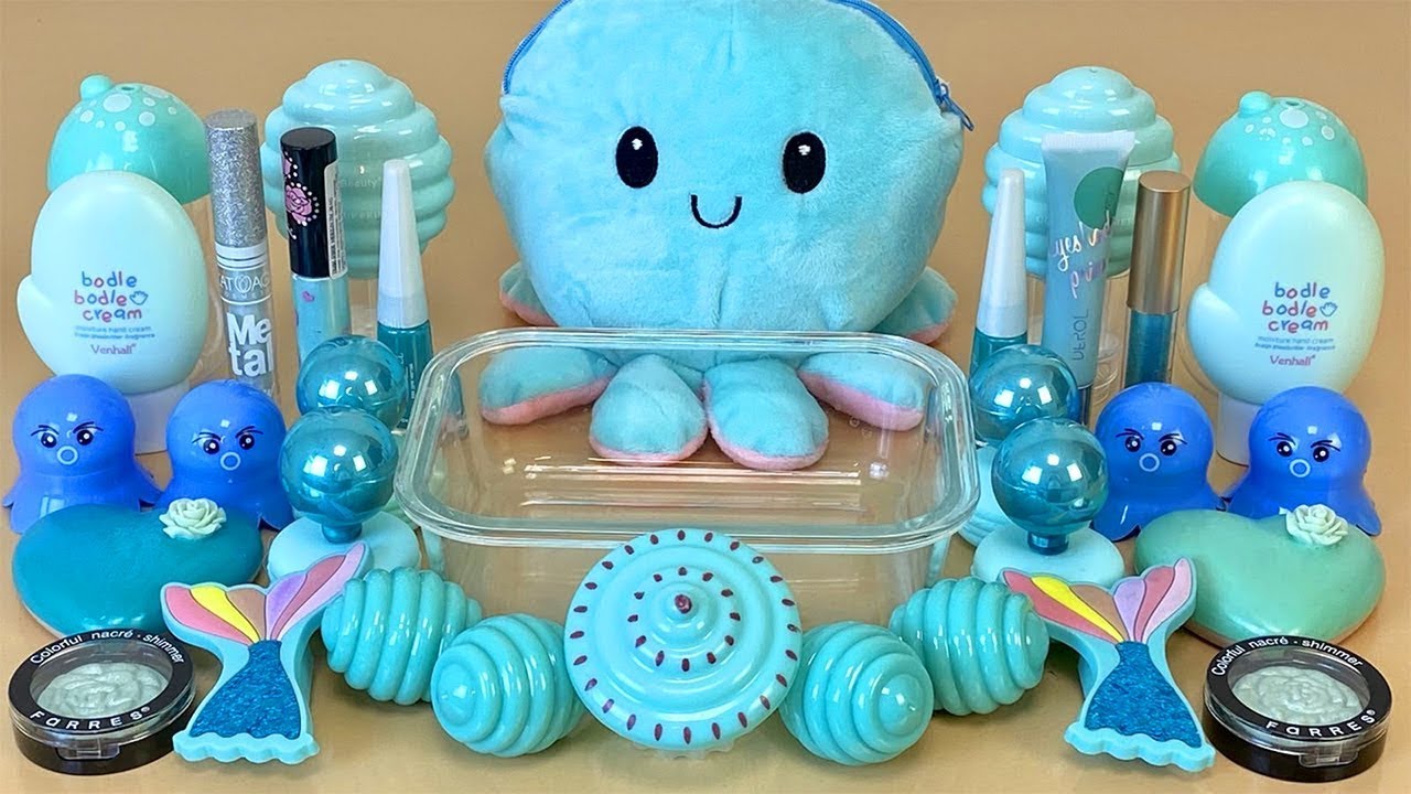 ASMR Slime Blue 💙 Mixing eyeshadow, makeup and glitter into Slime. Relaxing slime video.