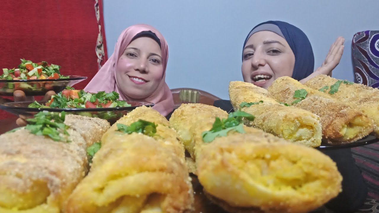 تحد اكل رول الدجاج🐤 الطاذج🌯 مين اسرع امال ضد شيماء  مع العقاب 😂😂🌯