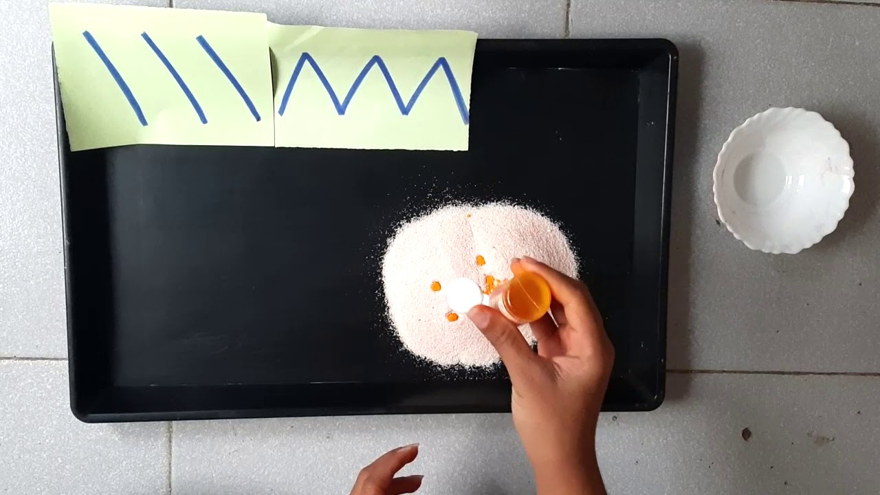 Pattern tracing on salt or semolina   |   MMI Bibvewadi   |   Preschool
