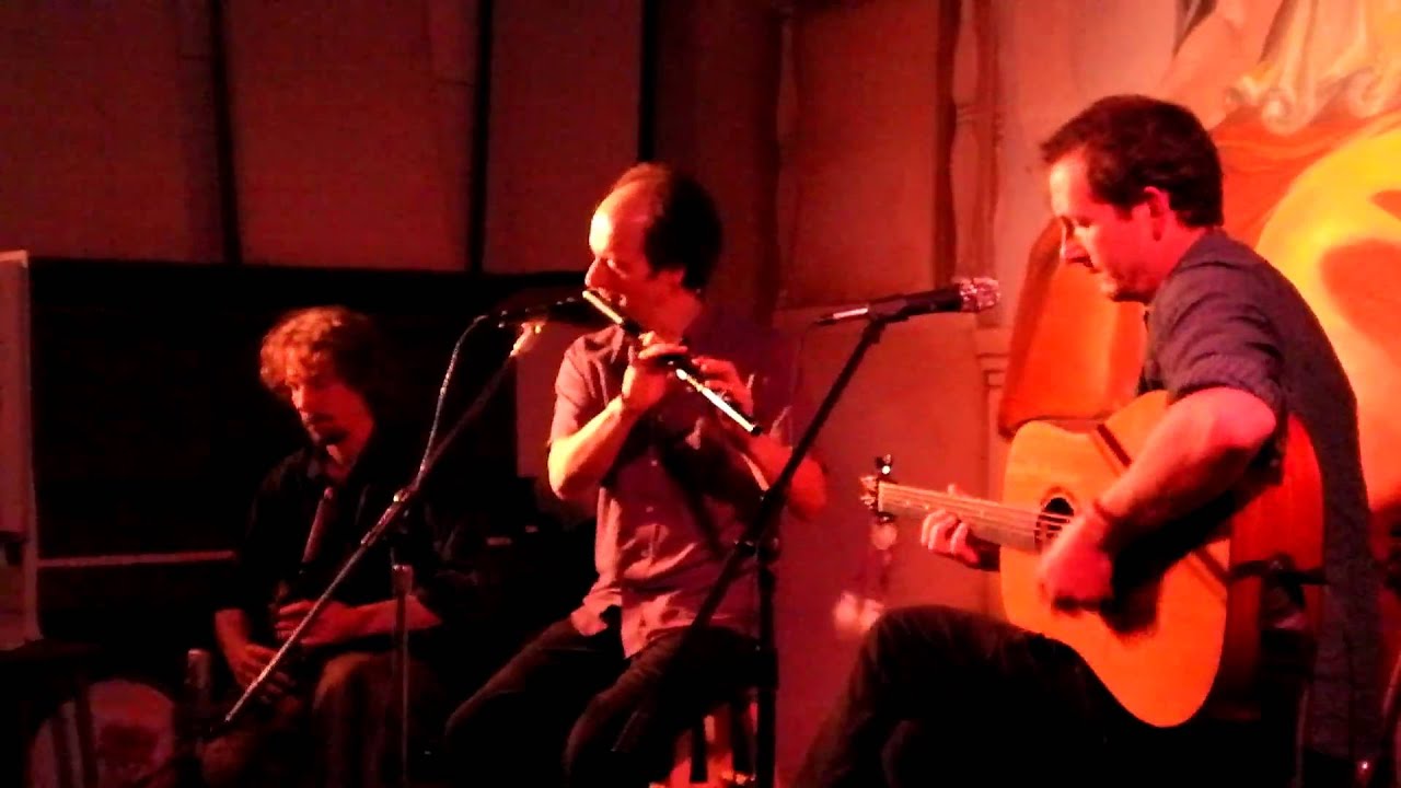 John Williams, John Doyle, and Tim Britton play a set of jigs at Cafe Paradisio in Fairfield, IA