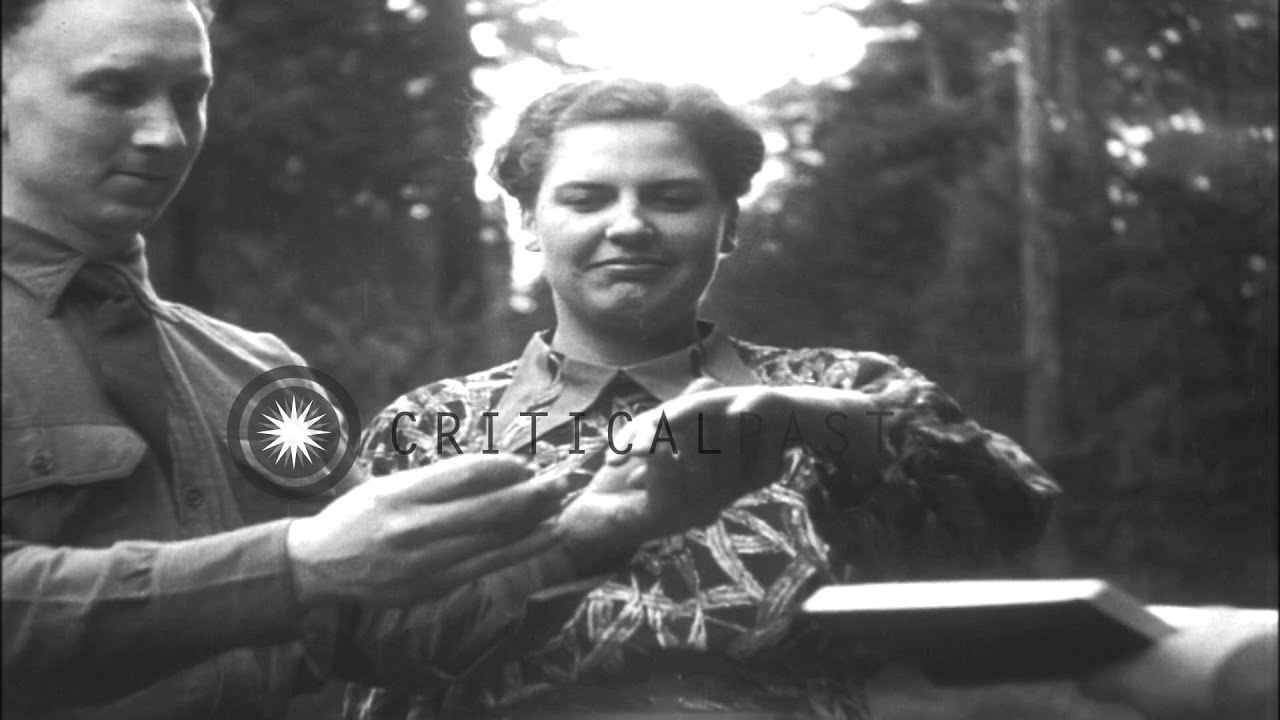 A Civilian Conservation Corps (CCC) Camp soldier or ' tree trooper' marries a wom...HD Stock Footage