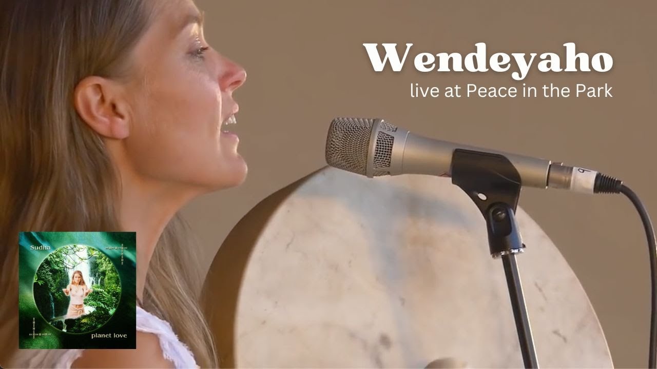 Sudha performing the Cherokee chant, Wendeyaho, at Peace in the Park Festival, Oxford 2015