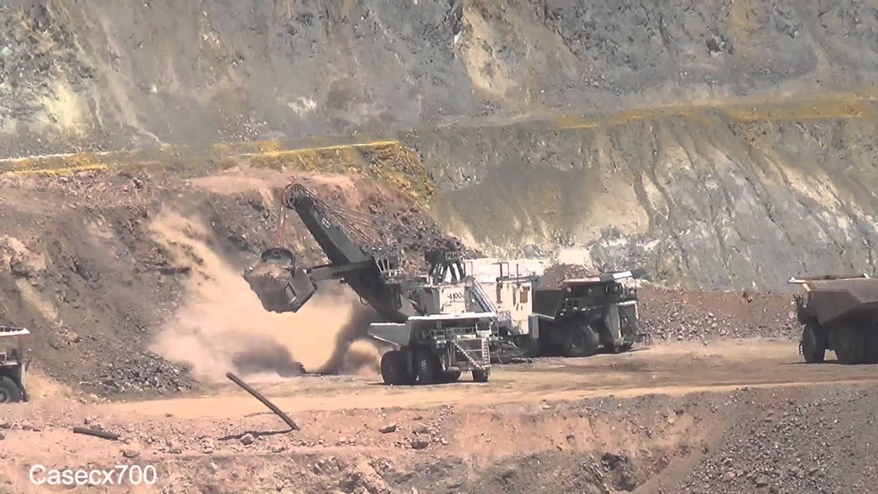 P&H 4100 Electric Wire Rope Shovel Loading Liebherr Dump Trucks