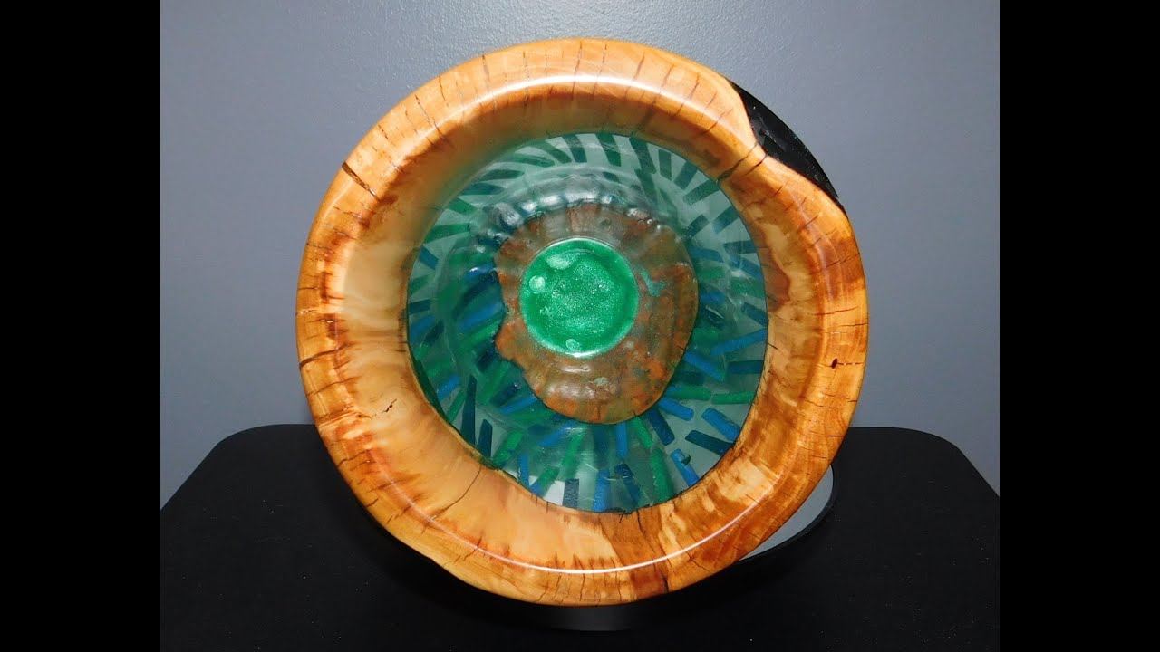 Cringe worthy.  Face meets vase woodturning.