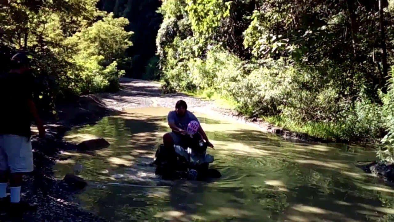 110CC CHINESE ATV IN BIG PUDDLE !