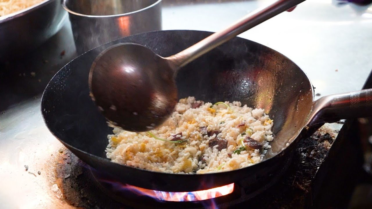 Chinese Street Food -Fried rice with egg, chicken leg burrito, ume-wrapped dough stick rice ball