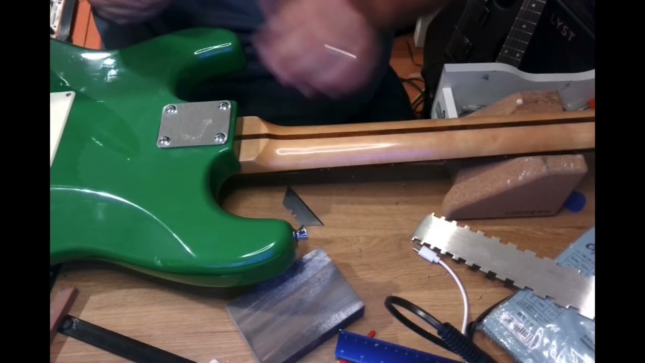 Oldish green Johnson Strat setup and review.  What does EMG design mean?!?
