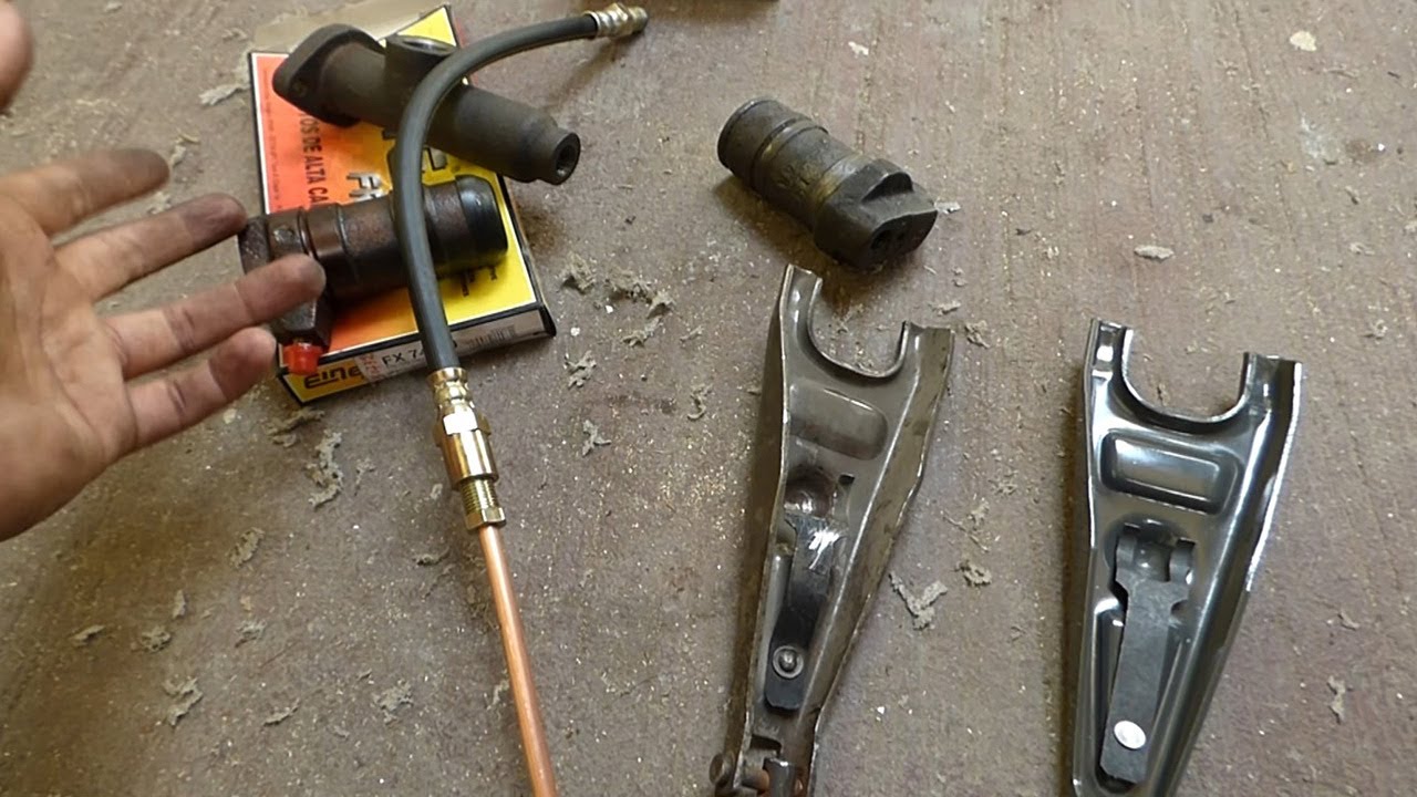 CAMBIO DE BOMBA, BOMBIN, FLEXIBLES Y HORQUILLA DE EMBRAGUE | PEUGEOT 504 83'