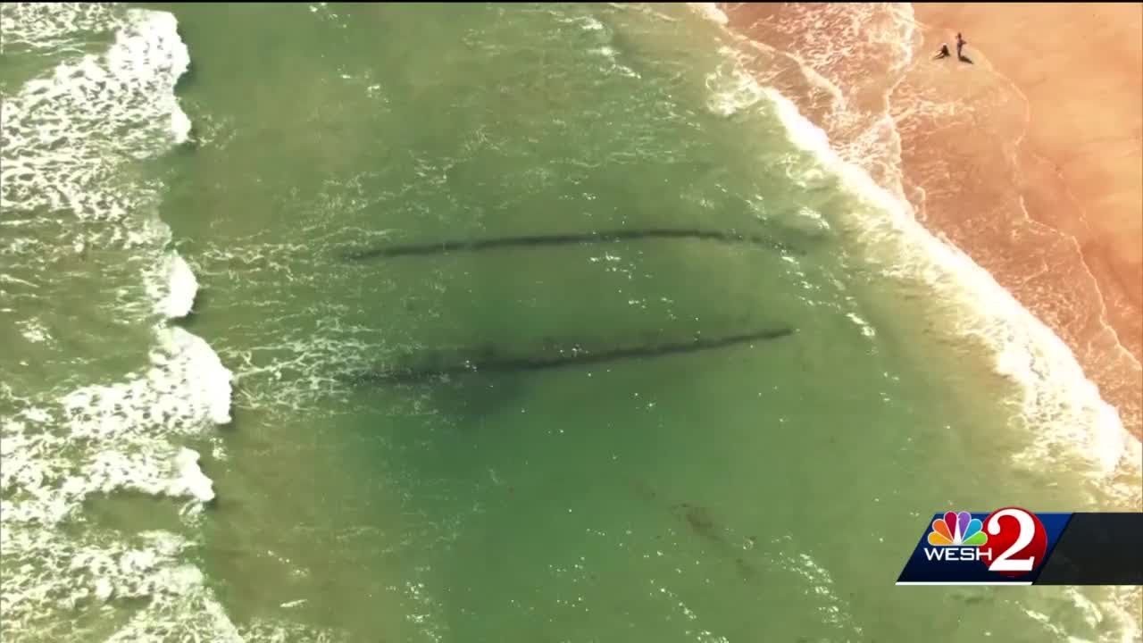Archeologists investigate shipwreck uncovered in Volusia County