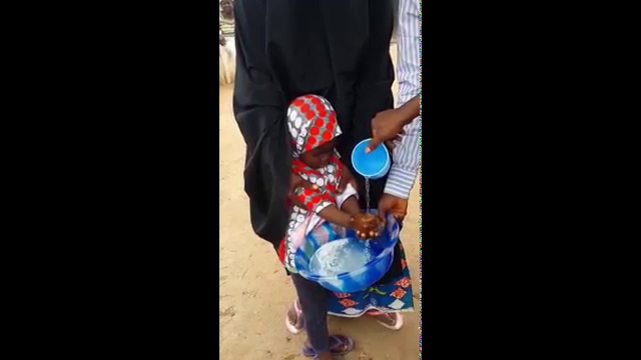 A child practicing handwashing at Daki Biyu community