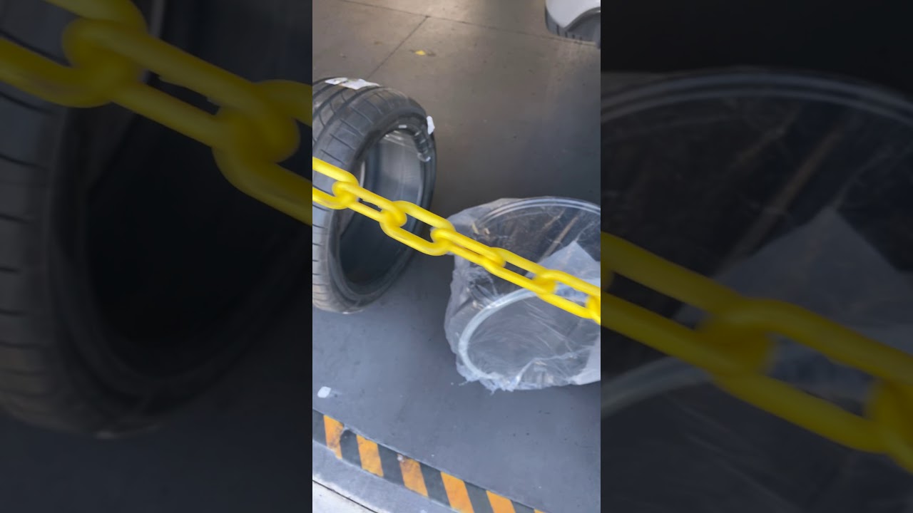 Charger Hellcat Replica rear 20x11 being mounted on.