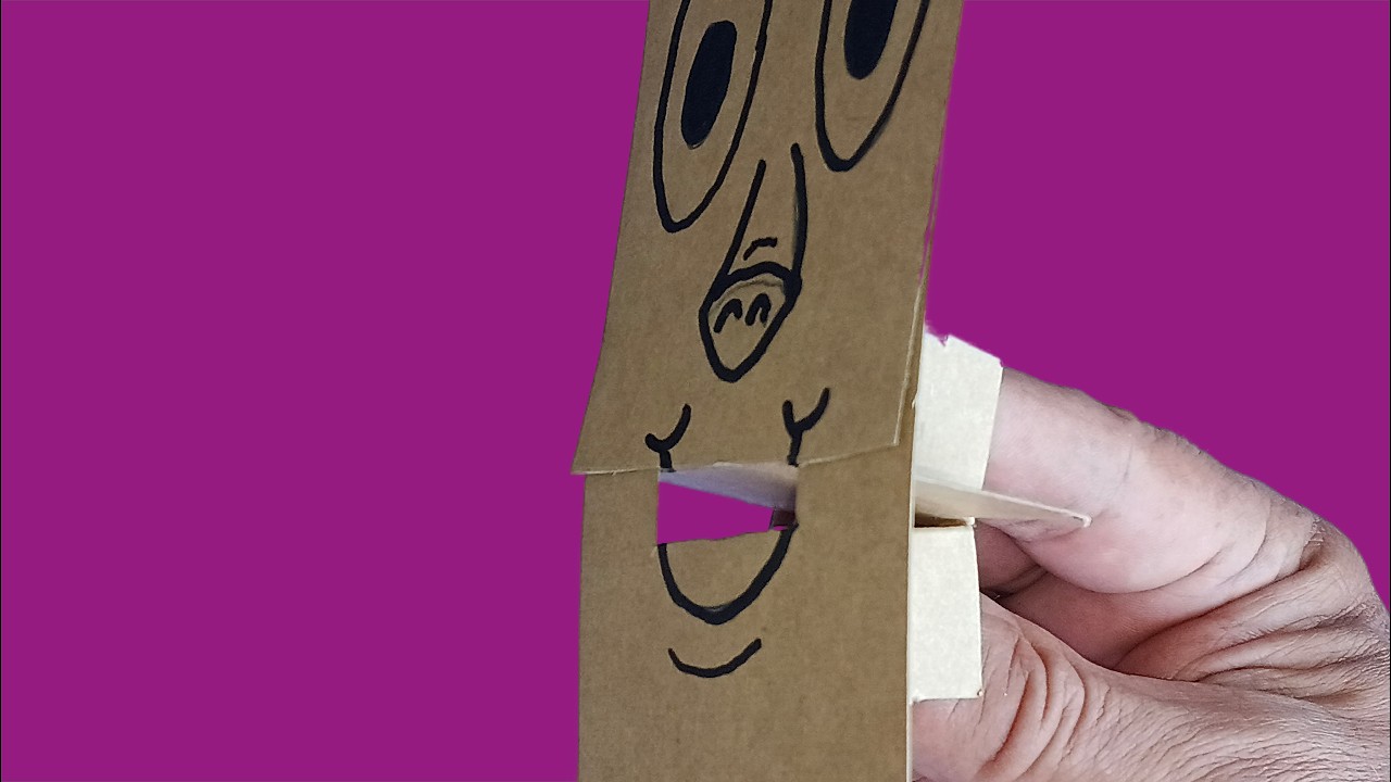 Making a Finger Puppet From Printed Blueprints on Cardboard