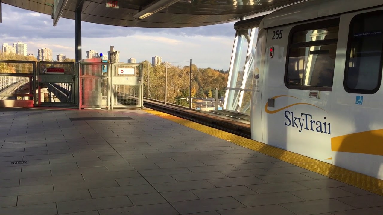 4-car Bombardier ART Mark II SkyTrain departs Production Way-University