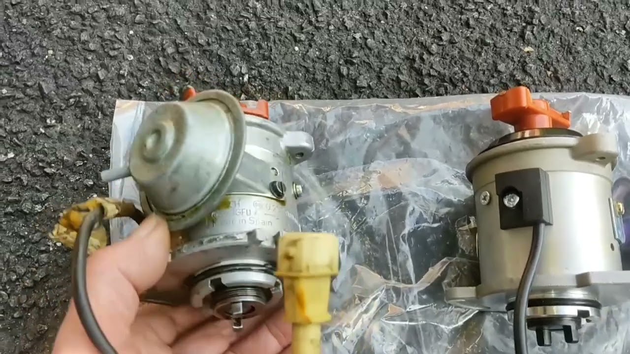 Peugeot 205 Gti. Replace oily distributor and check timing.