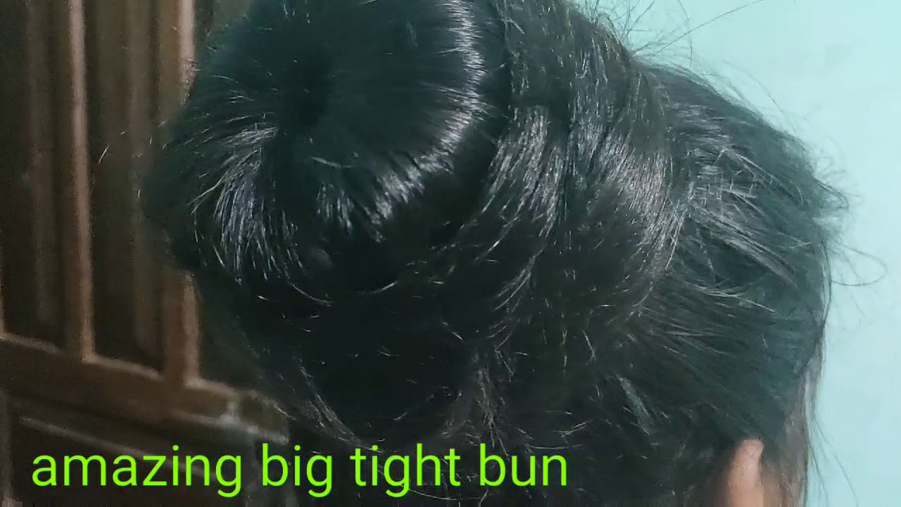 Big tight bun open. Full length hair play.