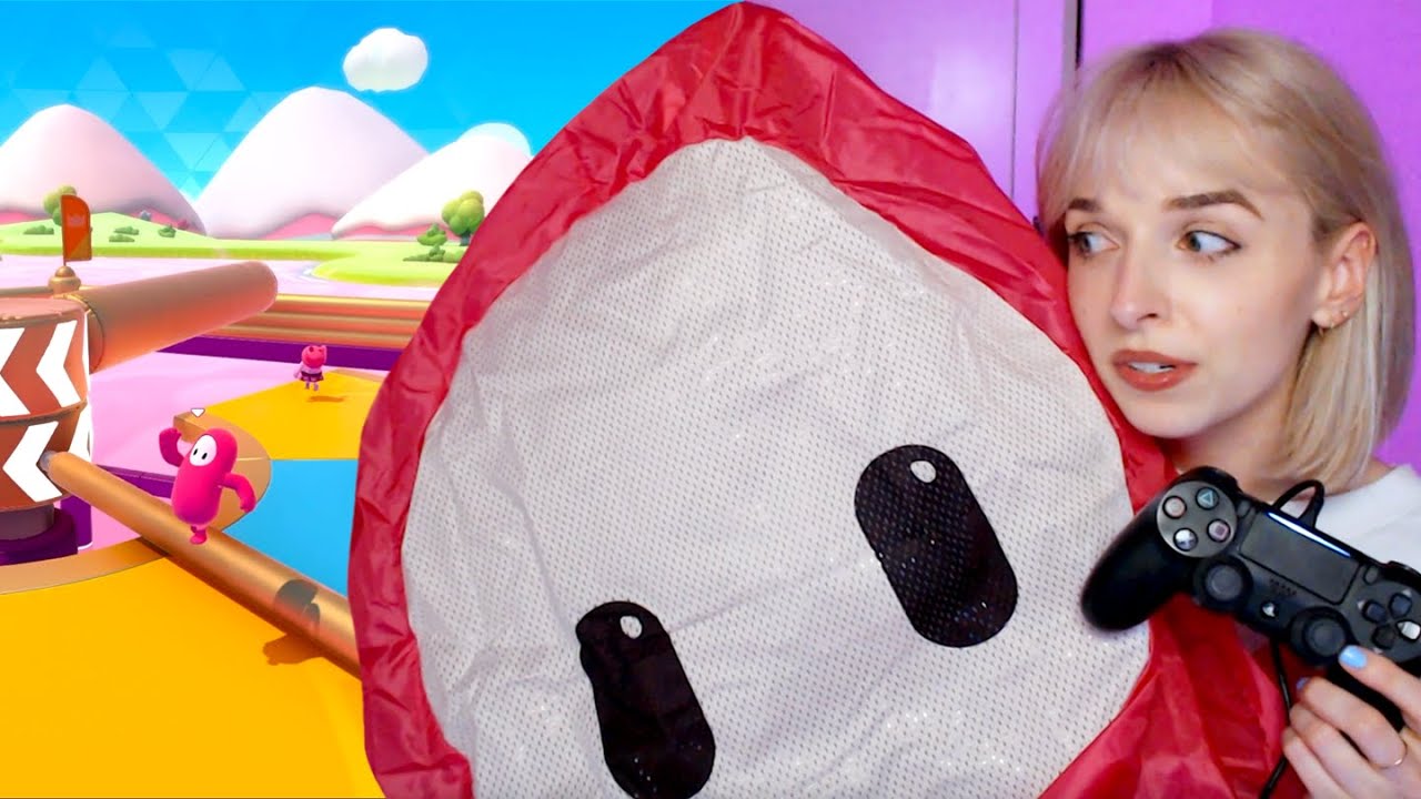 playing fall guys in an inflatable fall guys costume