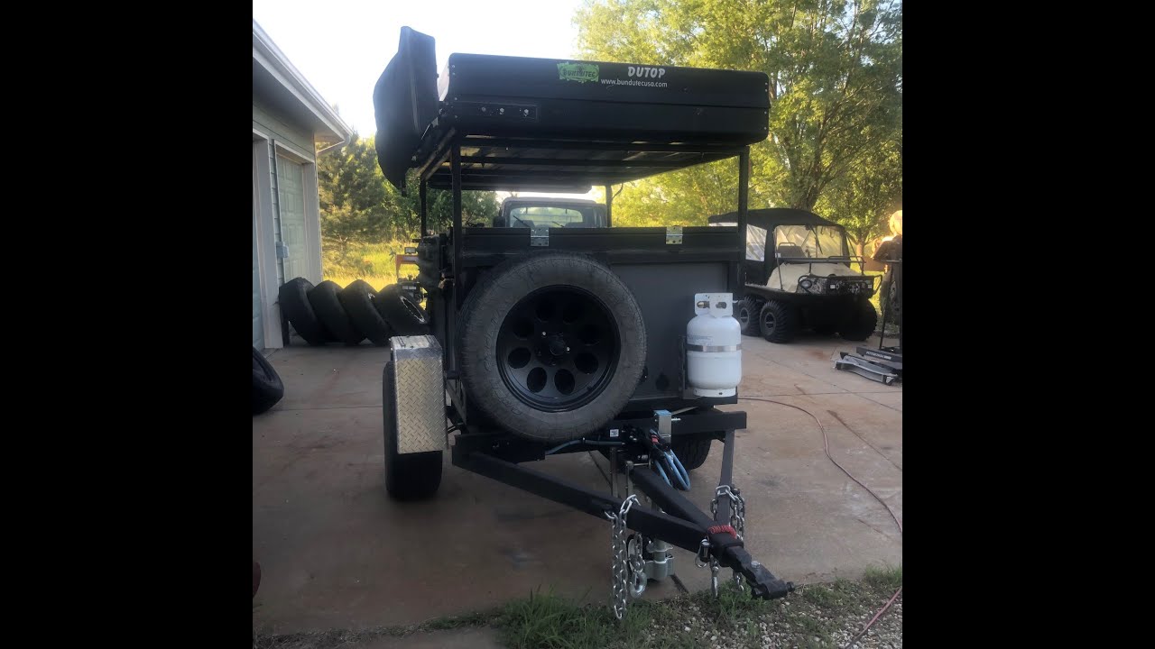 A walk around of a homemade camp trailer with roof top tent