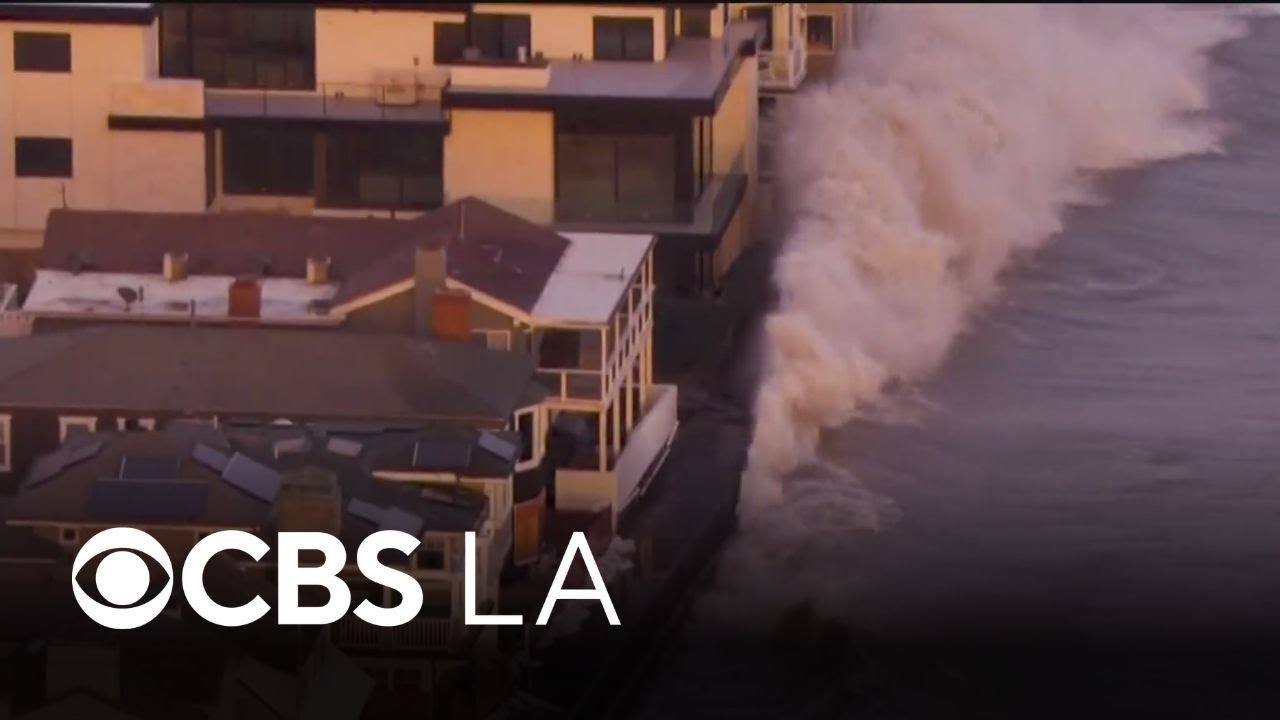 Crews cleanup sand and debris from Long Beach's powerful waves