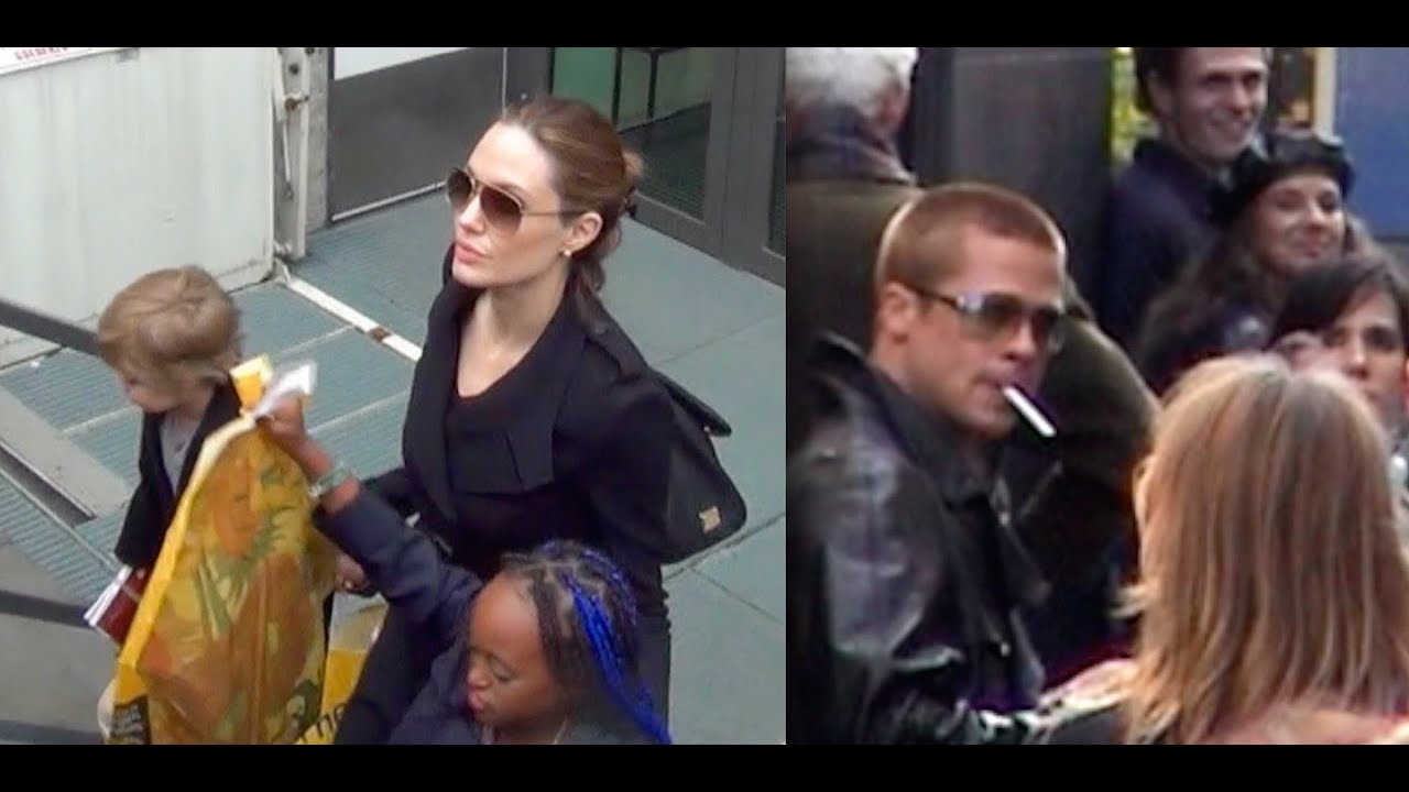 Brad pitt (Smoking a cigaret) & Angelina Jolie in Amsterdam.