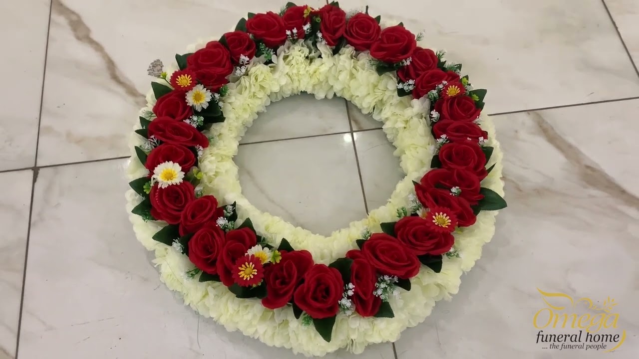 OMEGA FUNERAL HOME- FLOWER WREATHS