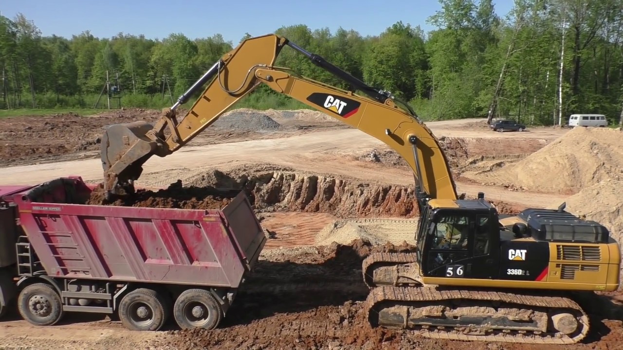 Cat 336D2 L loading Mercedes-Benz Actros trucks part 1