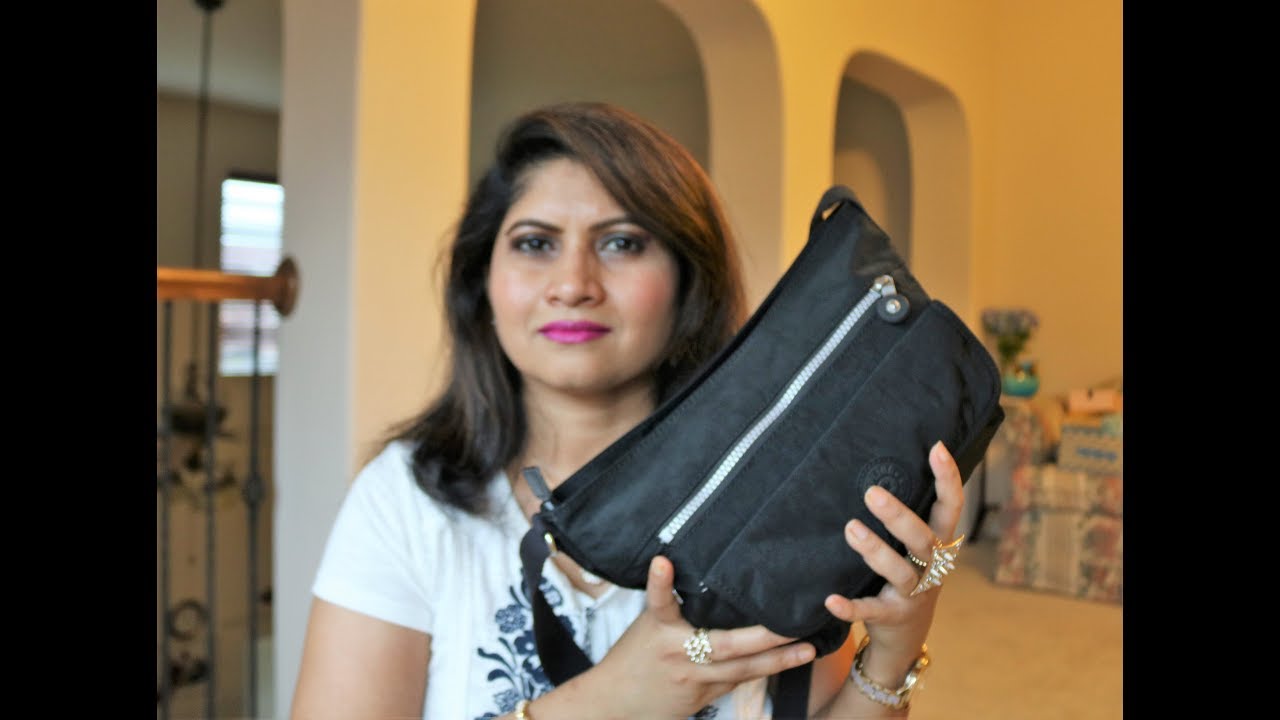 WHAT FITS IN KIPLING SYRO CROSSBODY BAG?
