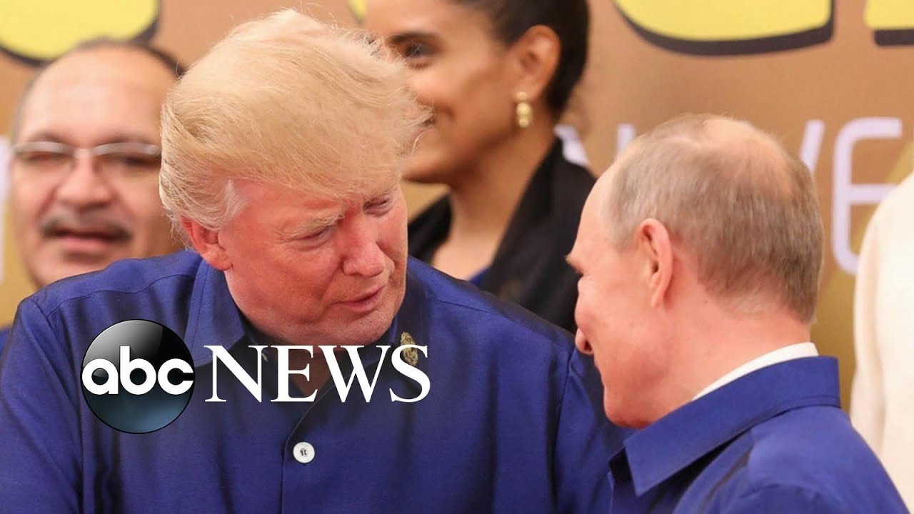 Trump travels to Vietnam and shakes hands with Putin