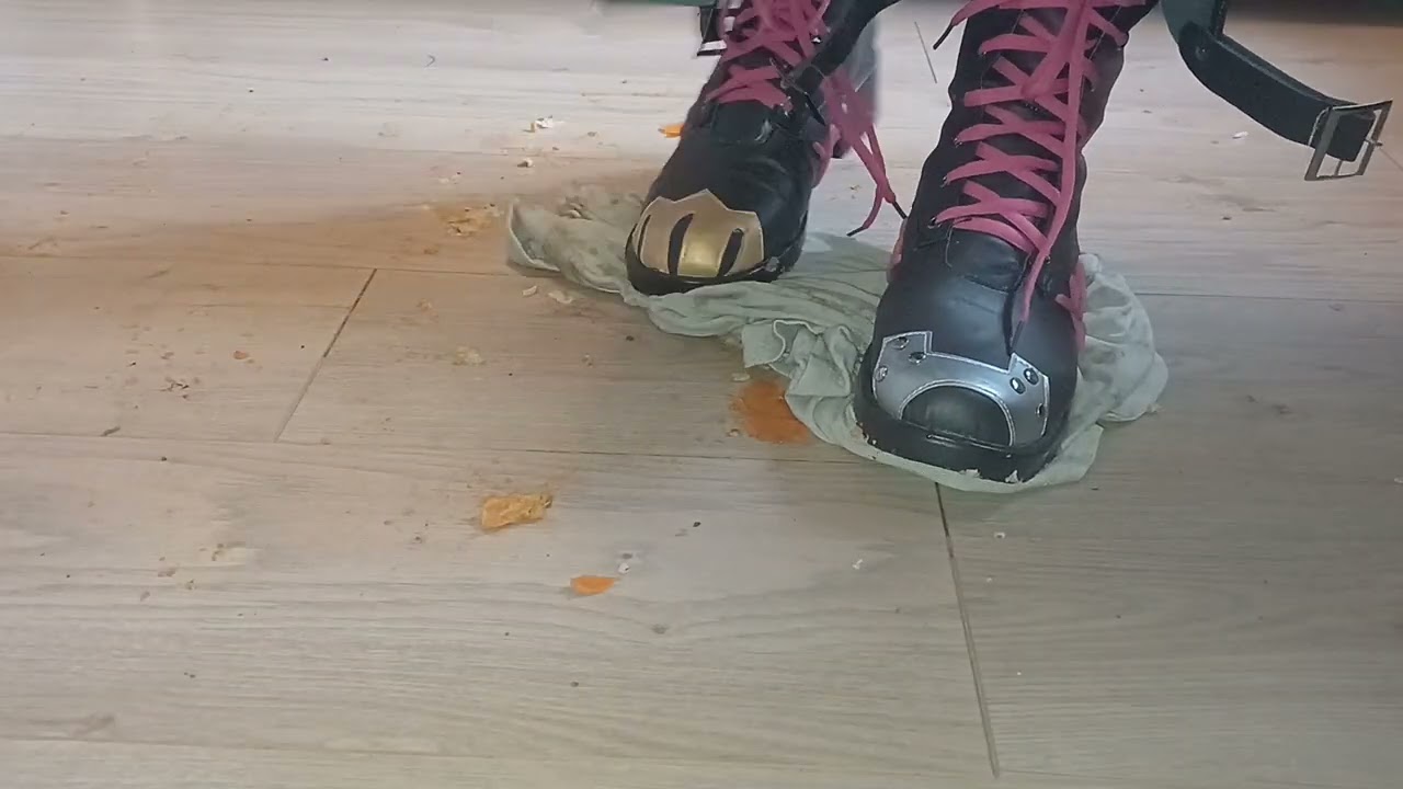 Jinx wipes her feet on a t-shirt