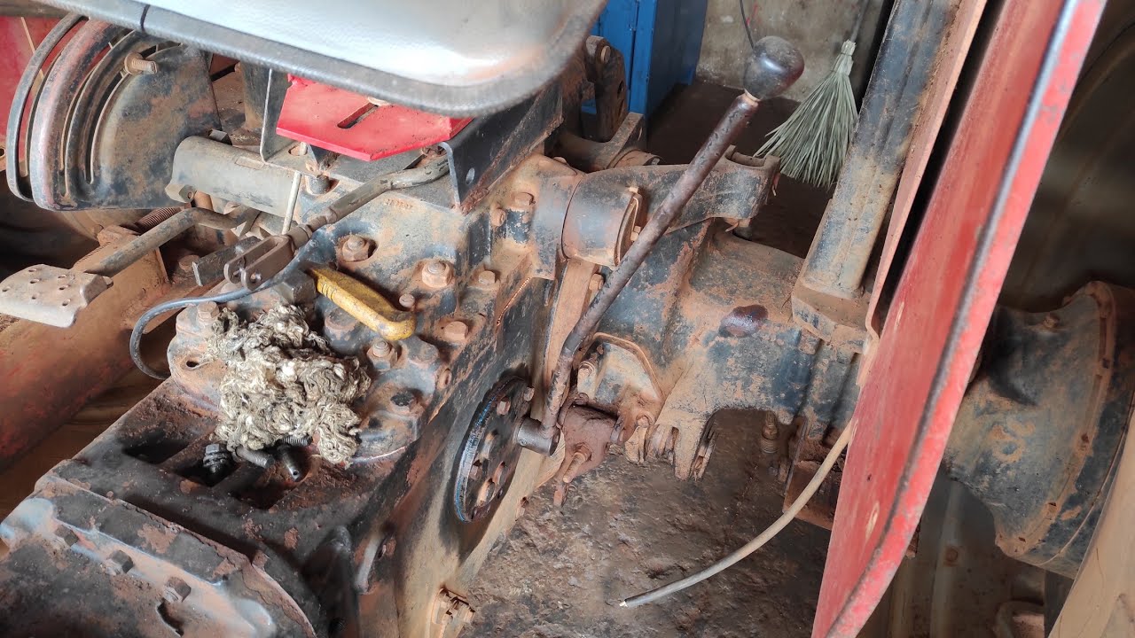 como trocar o garfo da alavanca da tomada de força trator Massey Ferguson