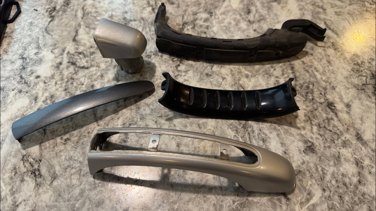 How to remove 2003-2010 Porsche Cayenne door handles and disassemble them.