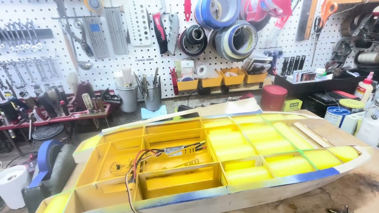 Dr. Jet installs some components.